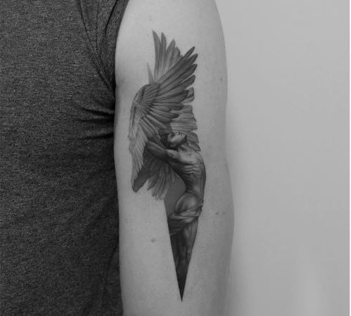 A Complex Graphic Icarus Tattoo