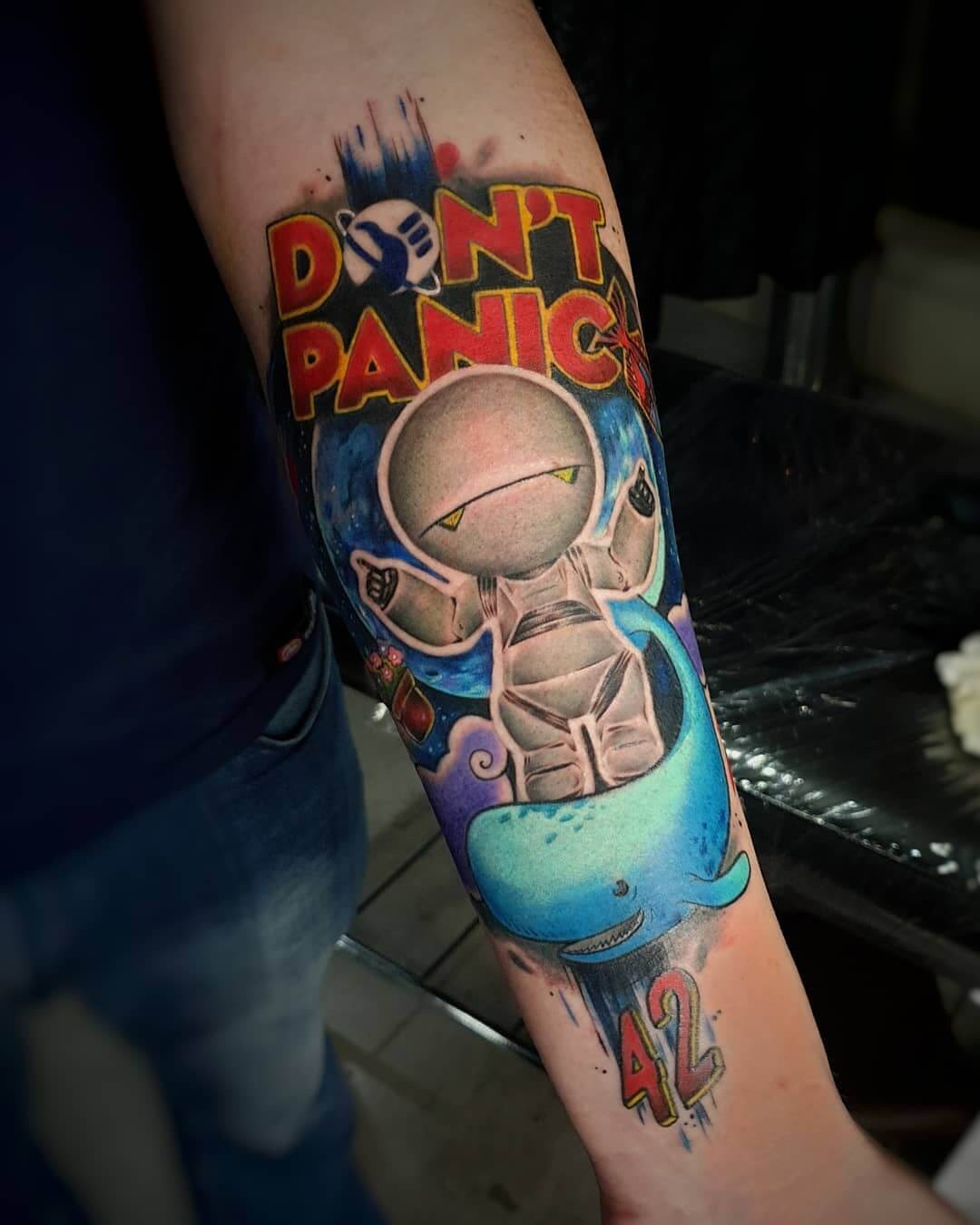 Bright And Colourful Hitchhiker’s Guide To The Galaxy Tattoo Designs