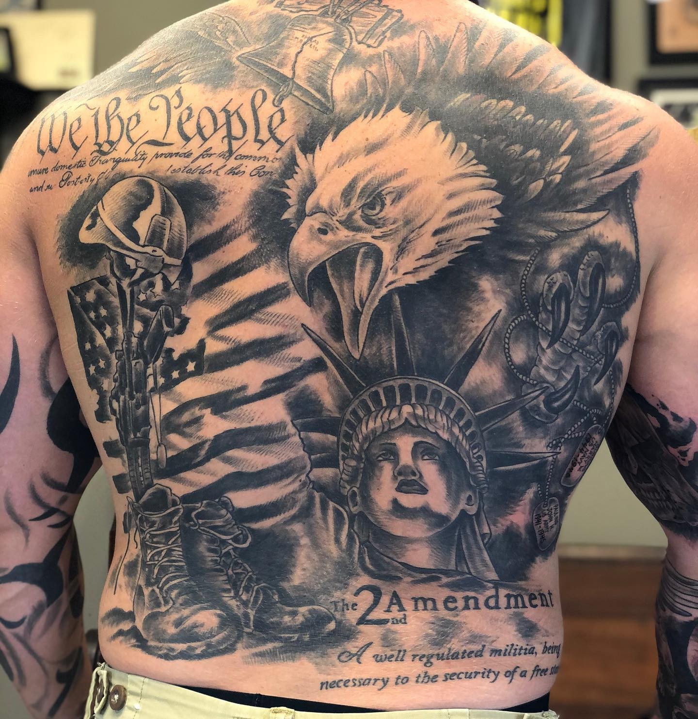 Cluster of Patriotic Tattoos Back Piece