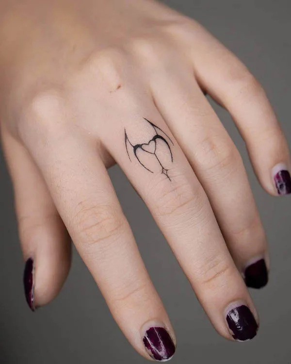 Finger Dot Tattoo