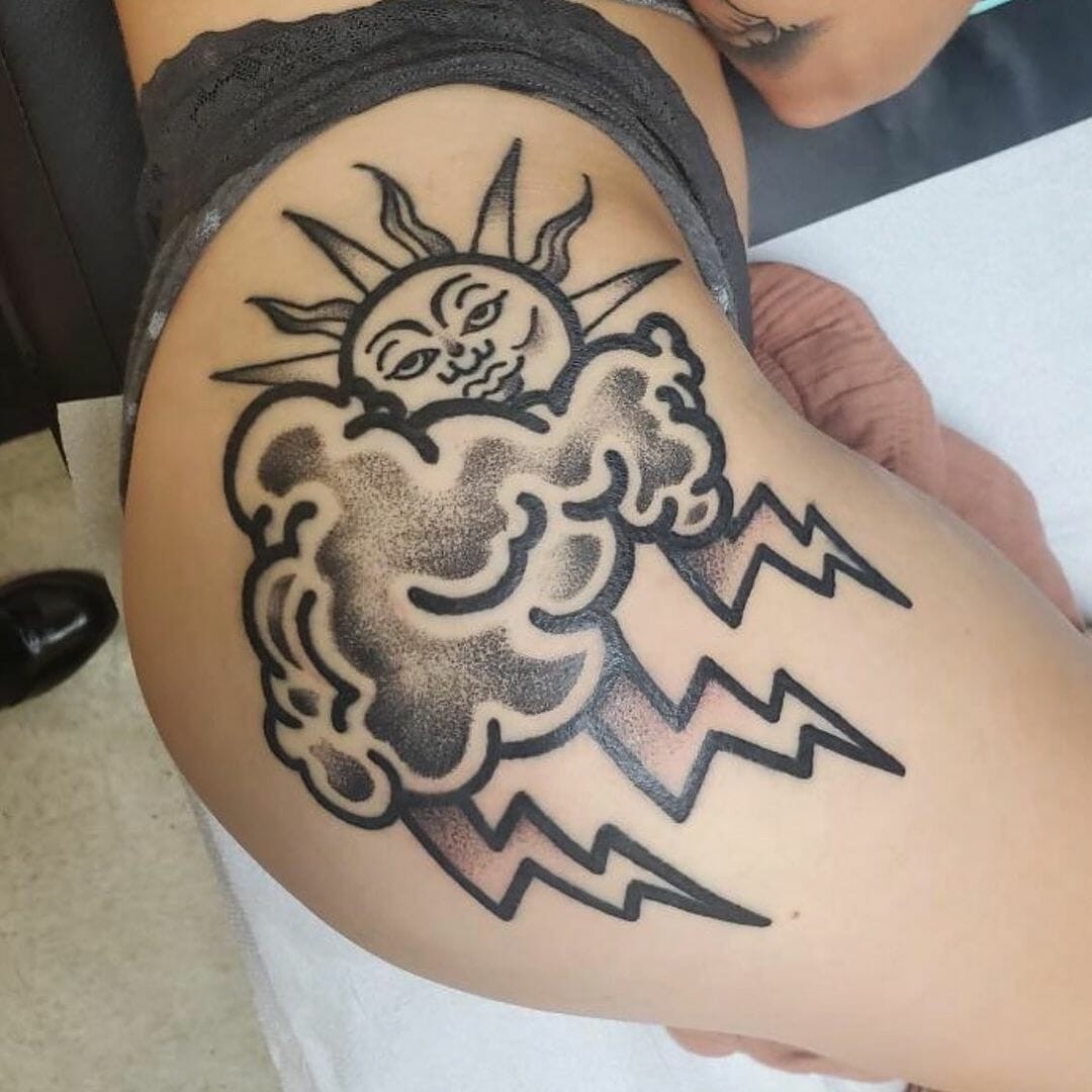 Elaborate Black And Grey Cloud Tattoo