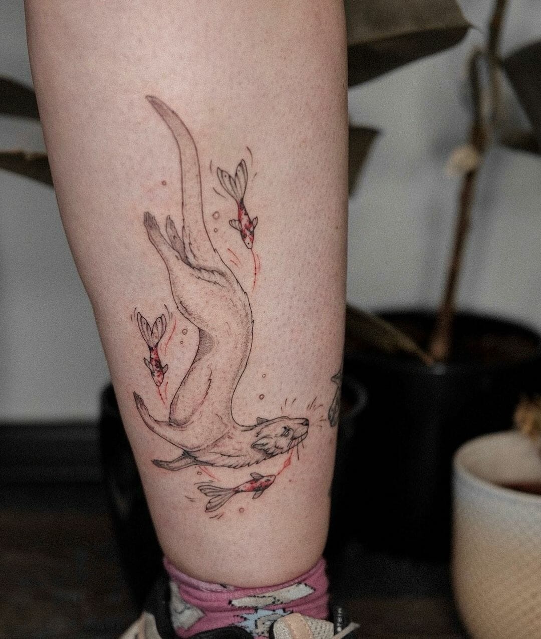 Swimming Otter Tattoo