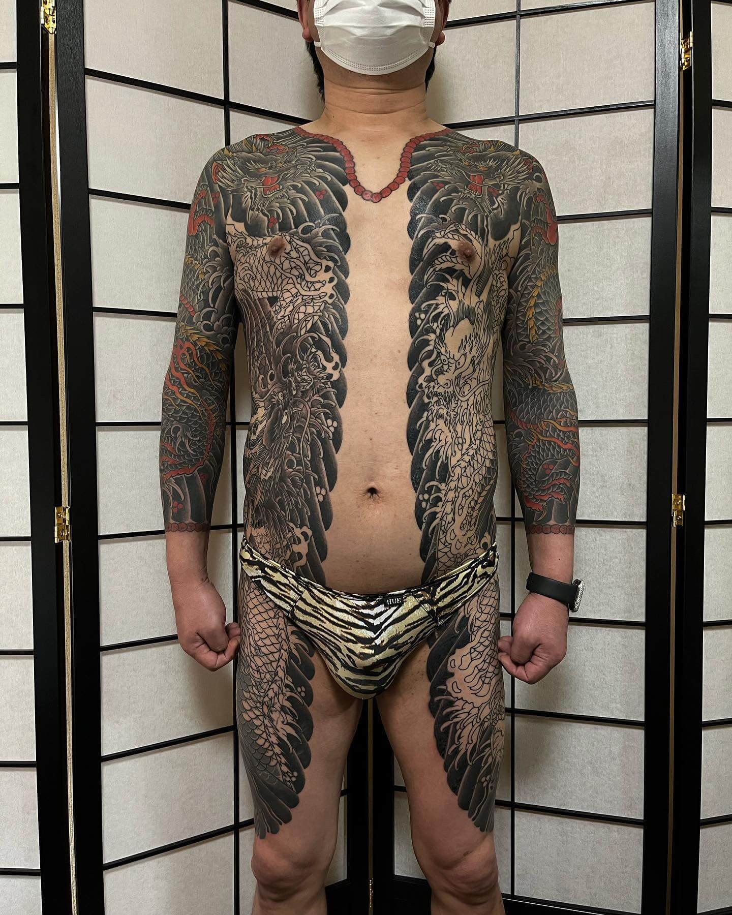 Japanese Bodysuit Tattoos With A Split