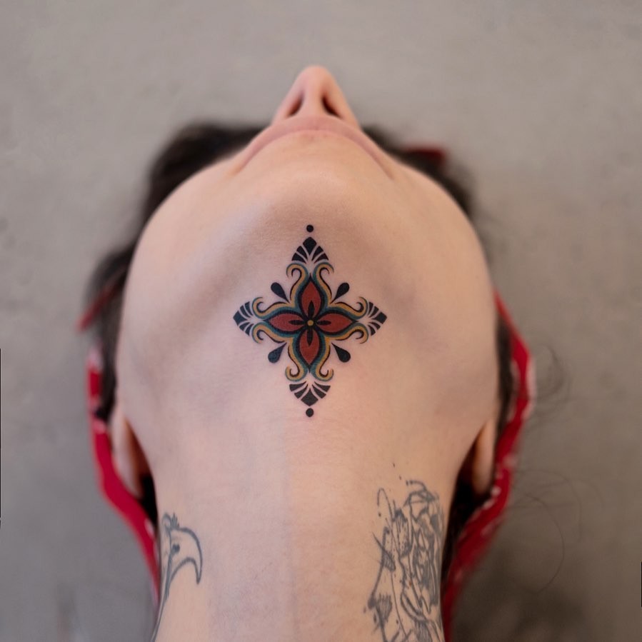 Ornamental Chin Tattoo