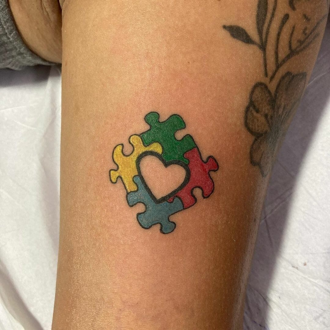 Colourful Autism Puzzle Piece Tattoo