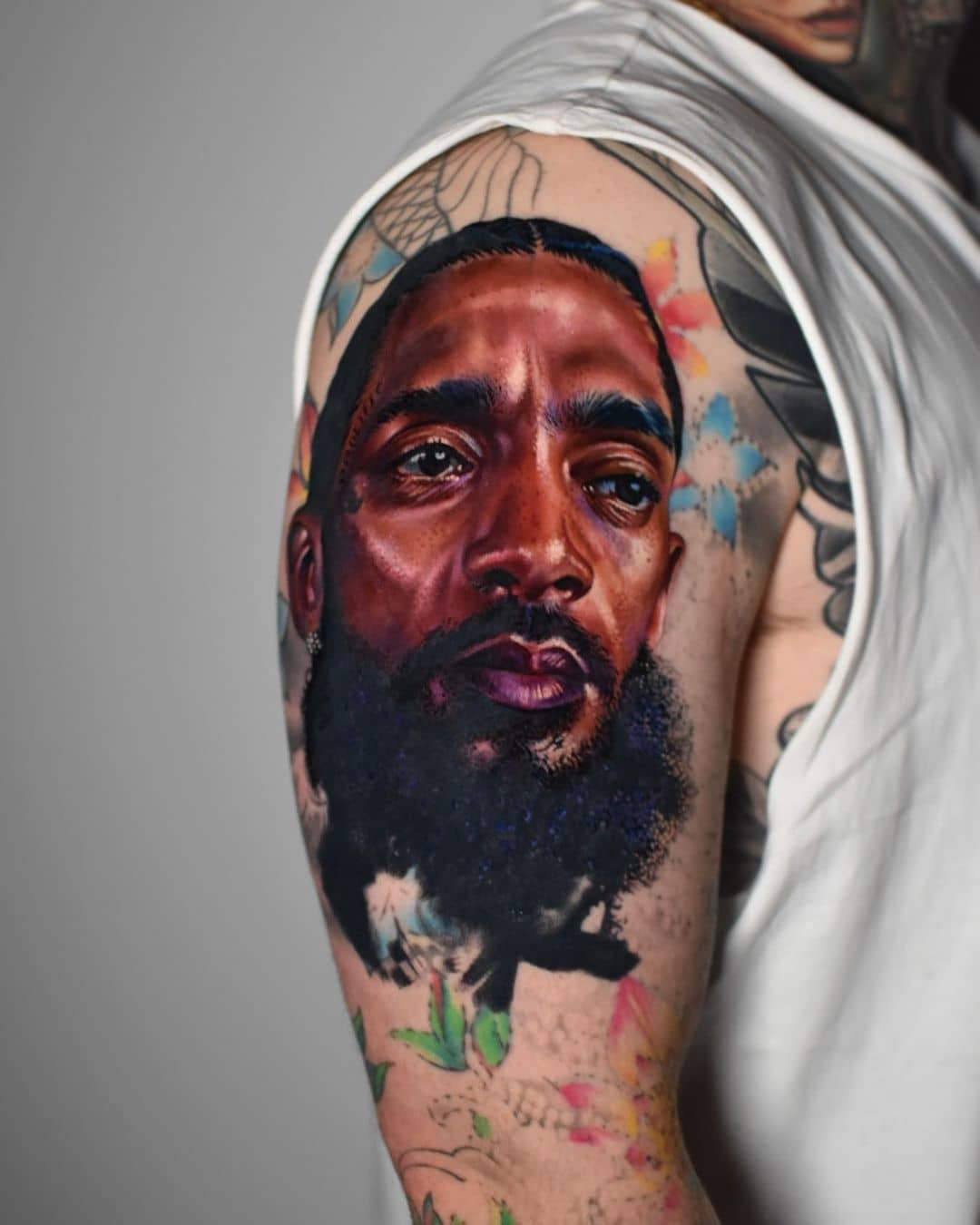 Realistic Nipsey Hussle Tattoo