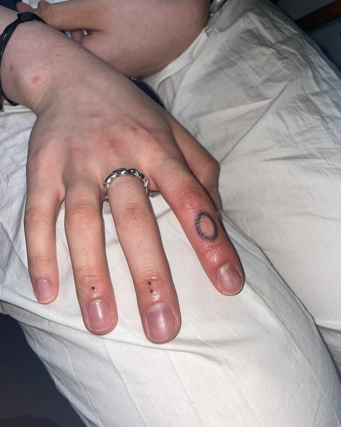 Small Finger Tattoo