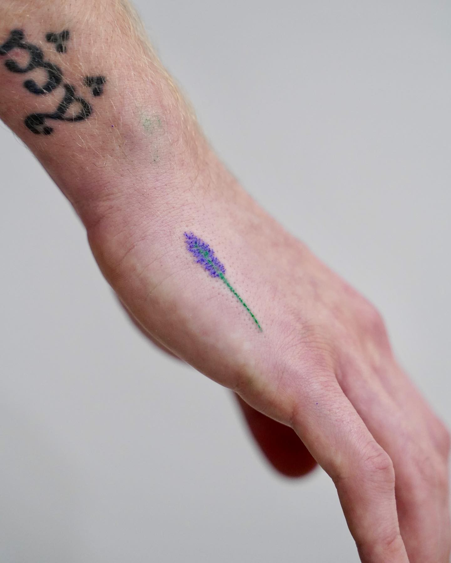 Lavender Hand Tattoo