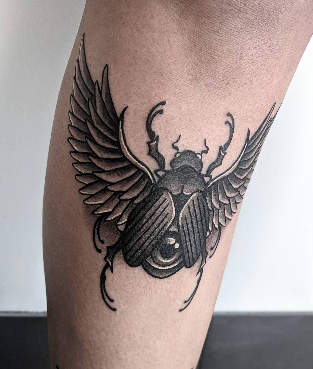 Black Ink Scarab Tattoo