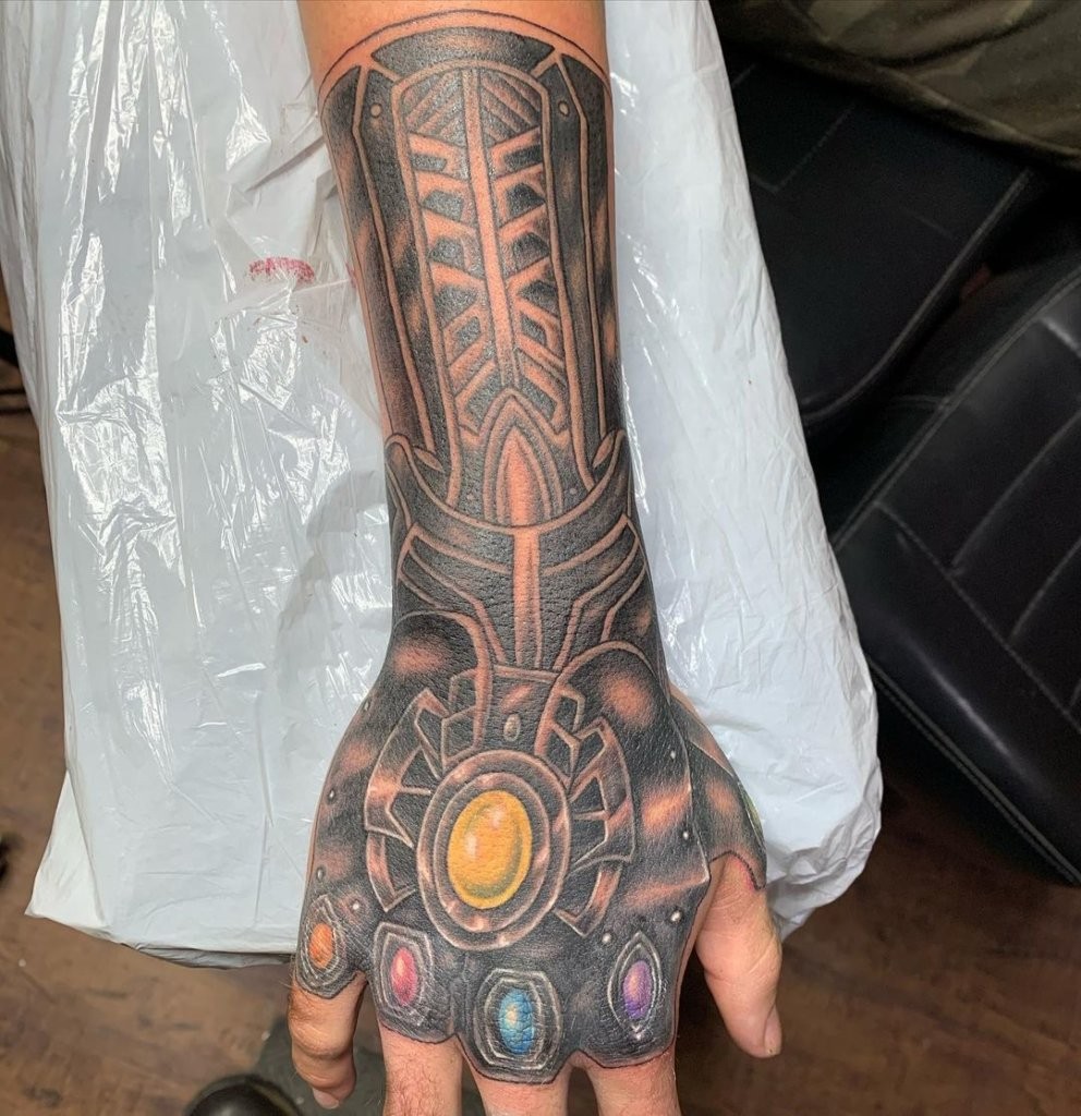 Realistic Infinity Gauntlet Tattoo