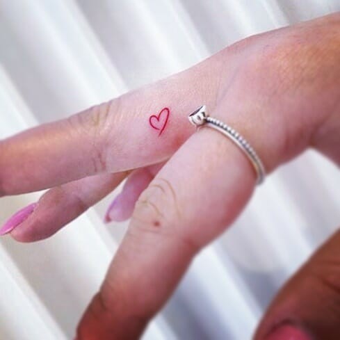 Heart Inner Finger Tattoo