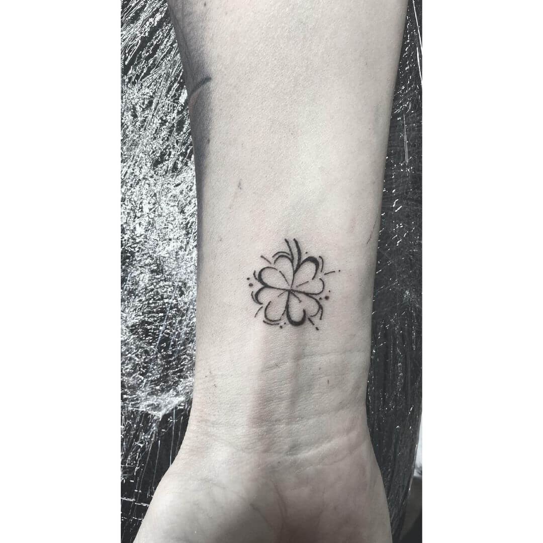 Four Leaf Clover With Chic Lines And Dots Tattoo