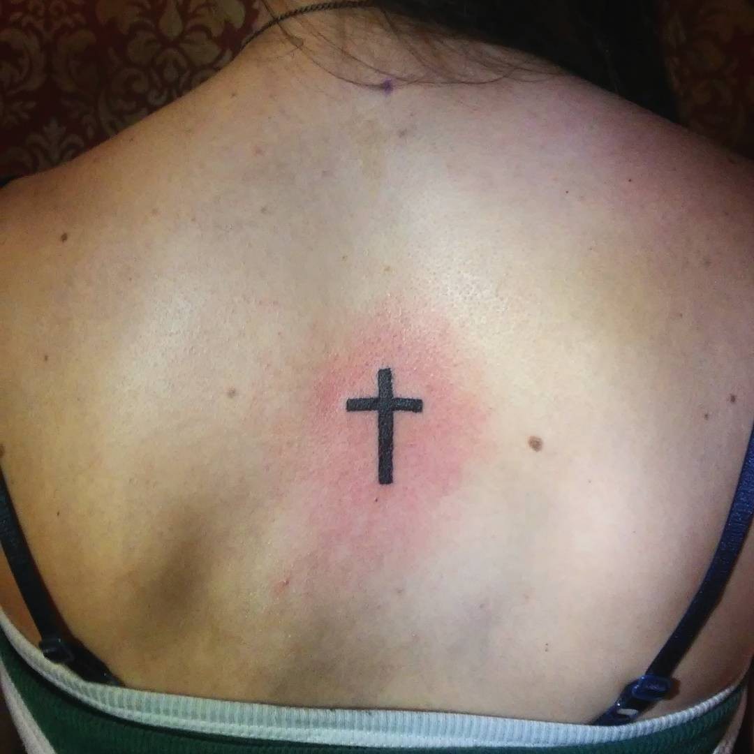 The Cross Tattoo Of Generosity And Benevolence