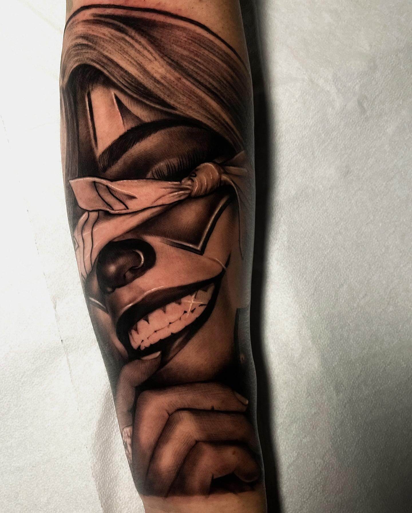 Sneer Mexican Descent Payasa Tattoo