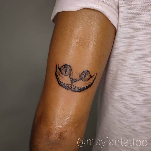 Minimalistic ‘Alice In Wonderland’ Tattoo