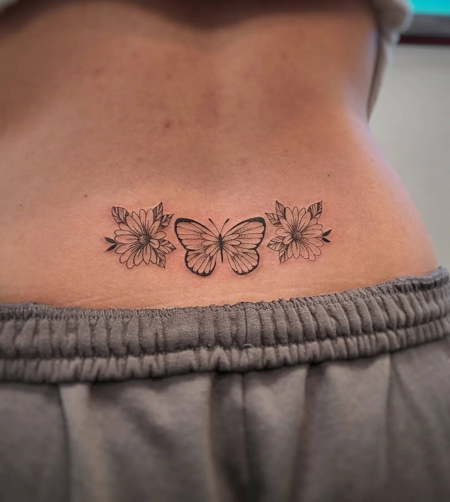 Lower Back Butterfly Tattoo Ideas For Women