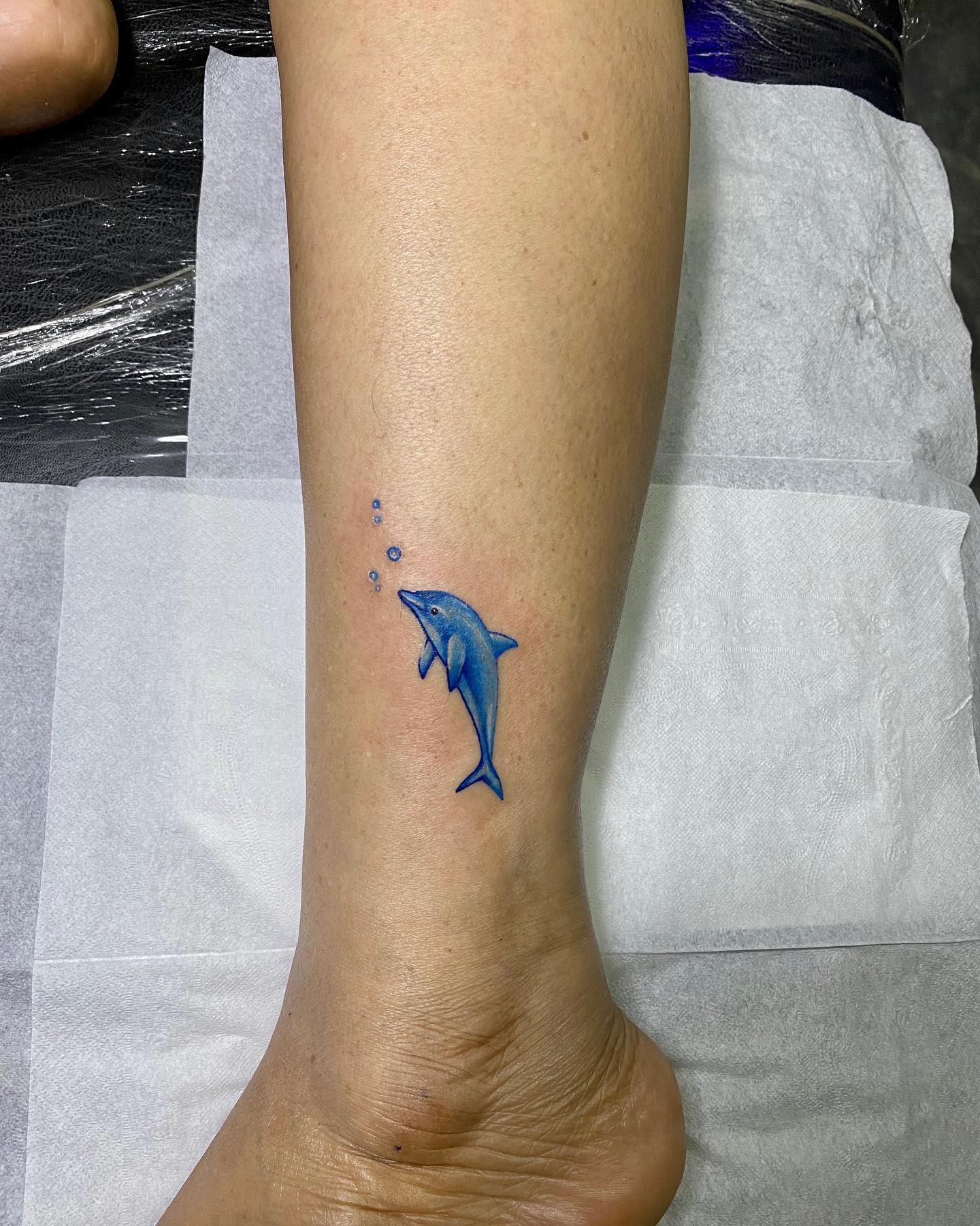 Cute And Tiny Dolphin Tattoo Designs