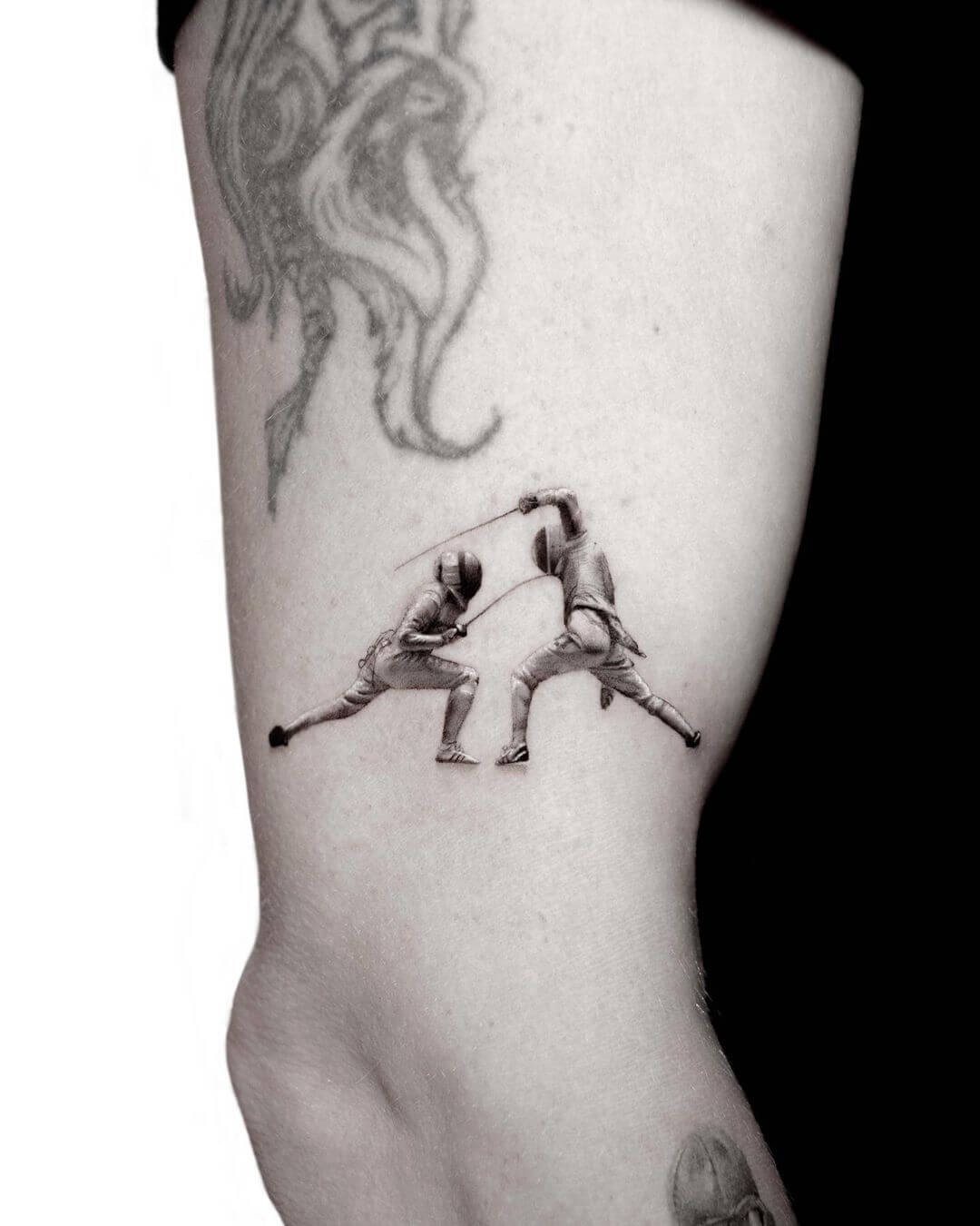 Micro Realistic Fencing Tattoo