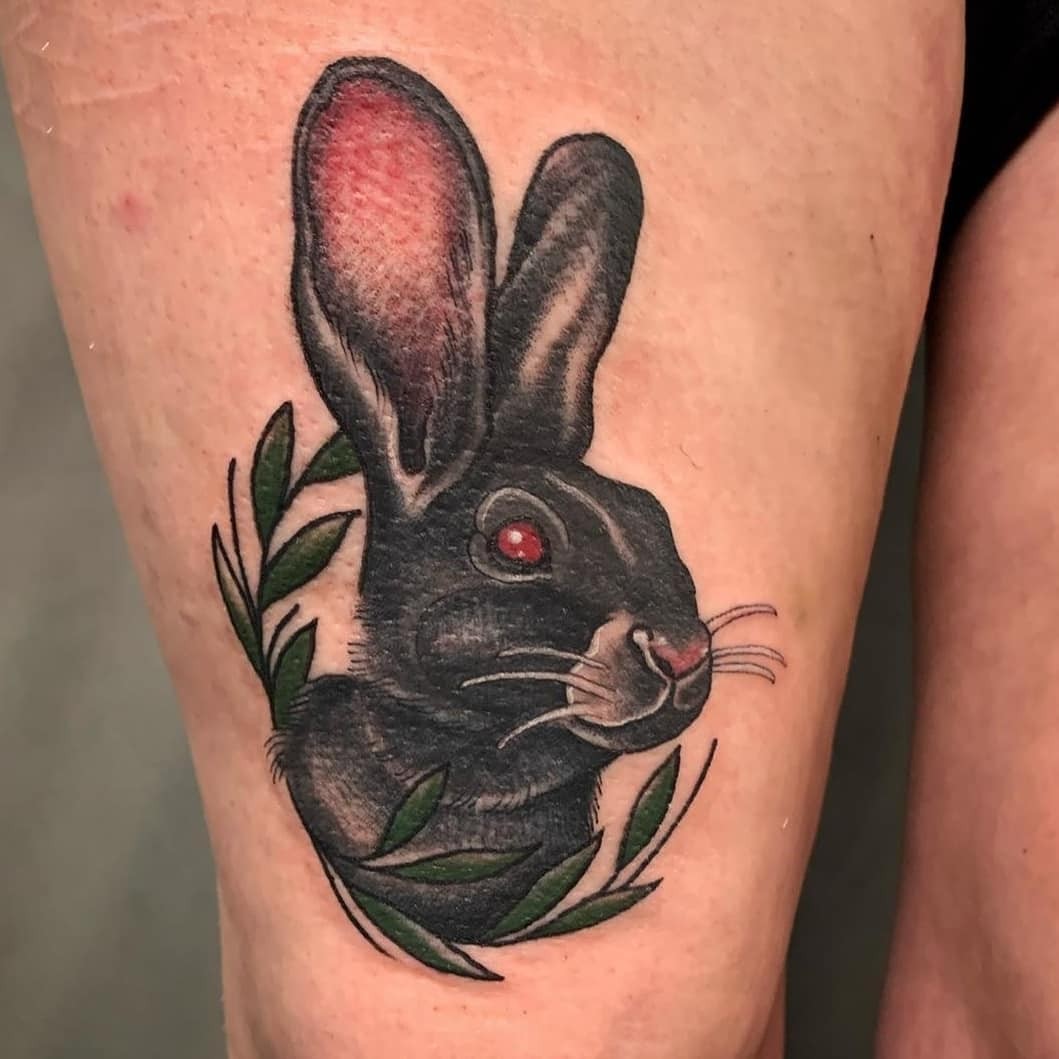 Black Rabbit Tattoo On The Knee