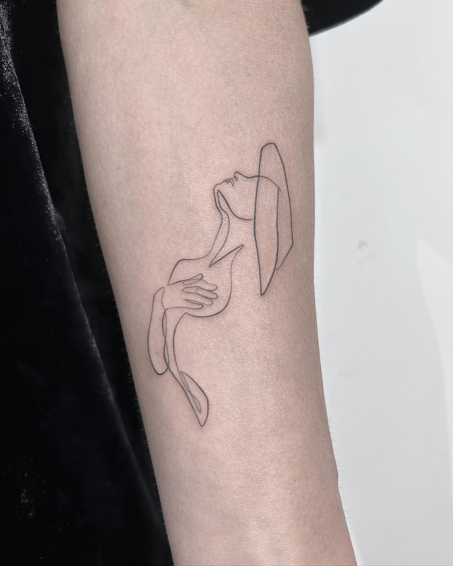 Fine Line Woman Tattoo