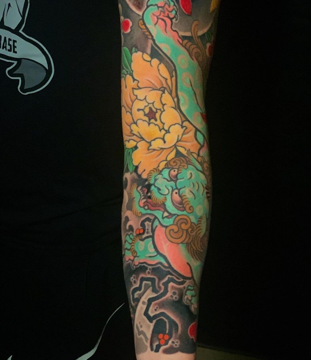 Full Sleeve Puffy Lion Dog Tattoo