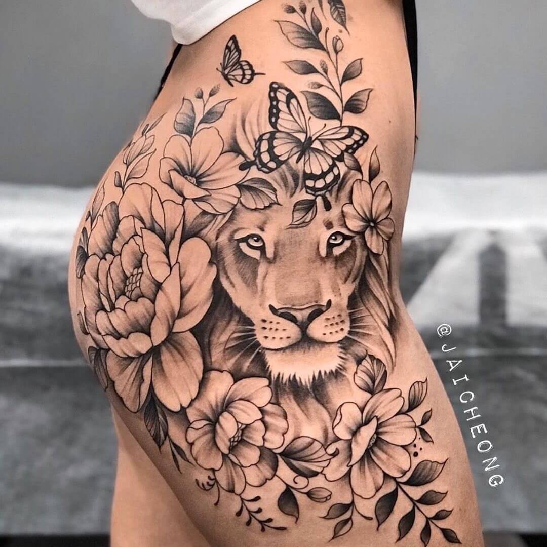 Amazing Lion And Butterfly Tattoos On Upper Thigh