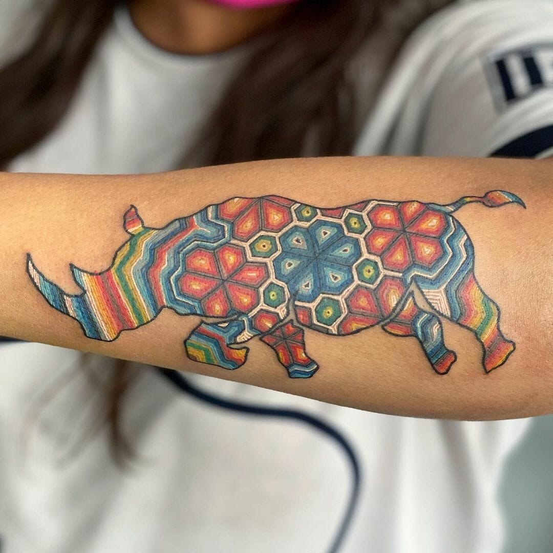 The Vibrant And Colourful Tribal Rhino Tattoos