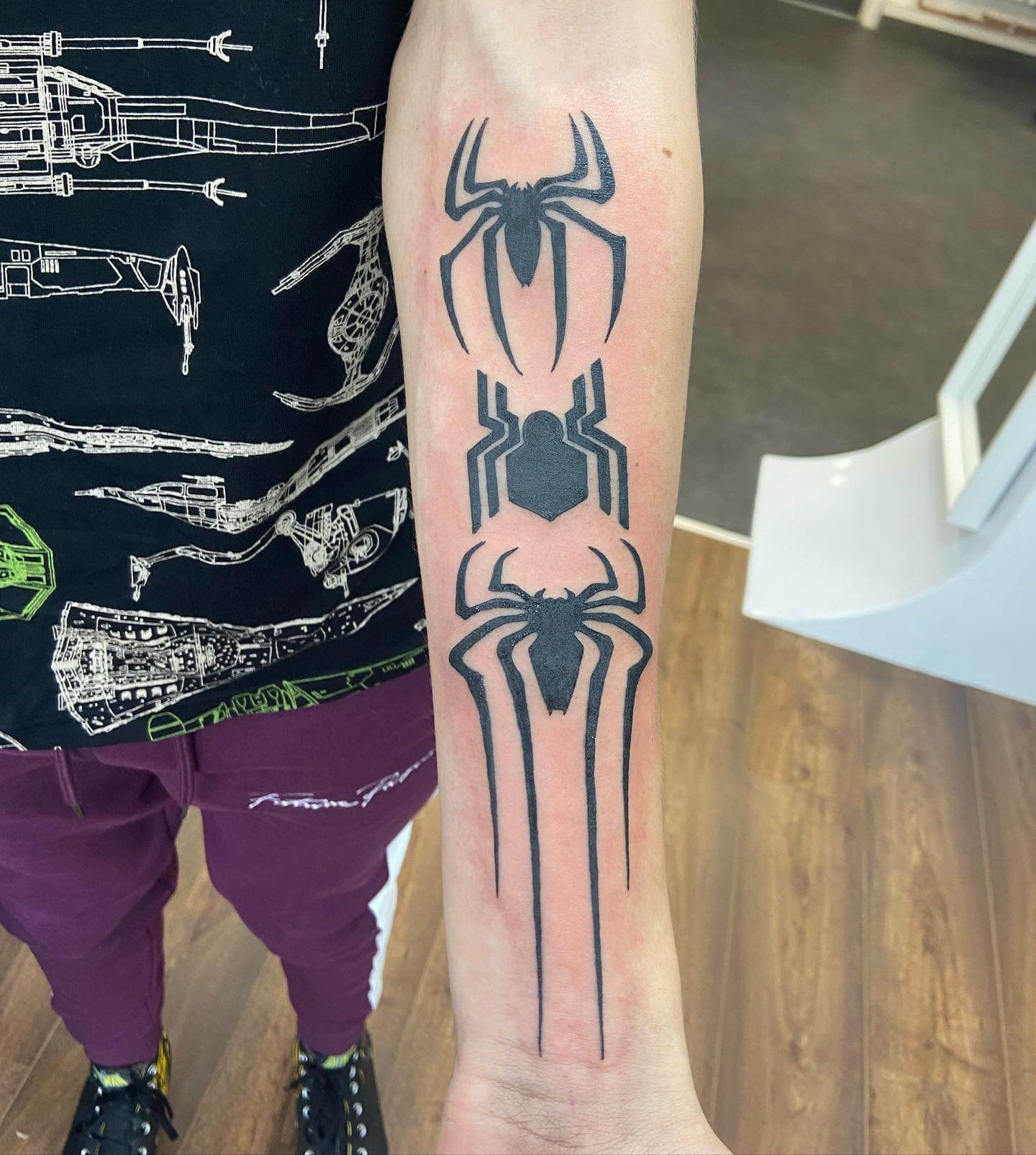 Variants Of Spiderman Logo Tattoo