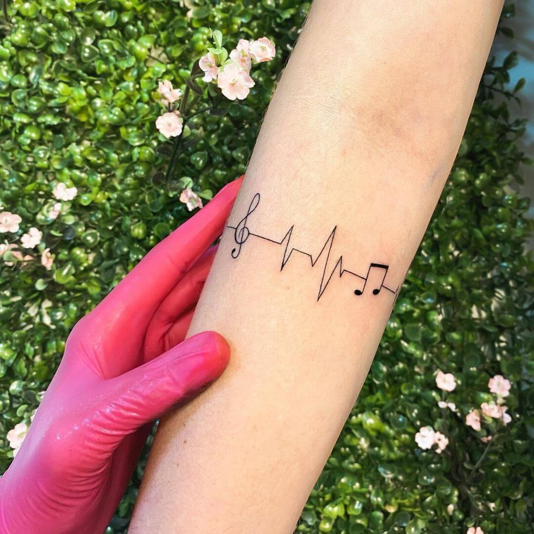 Minimalistic Heartbeat Music Tattoo