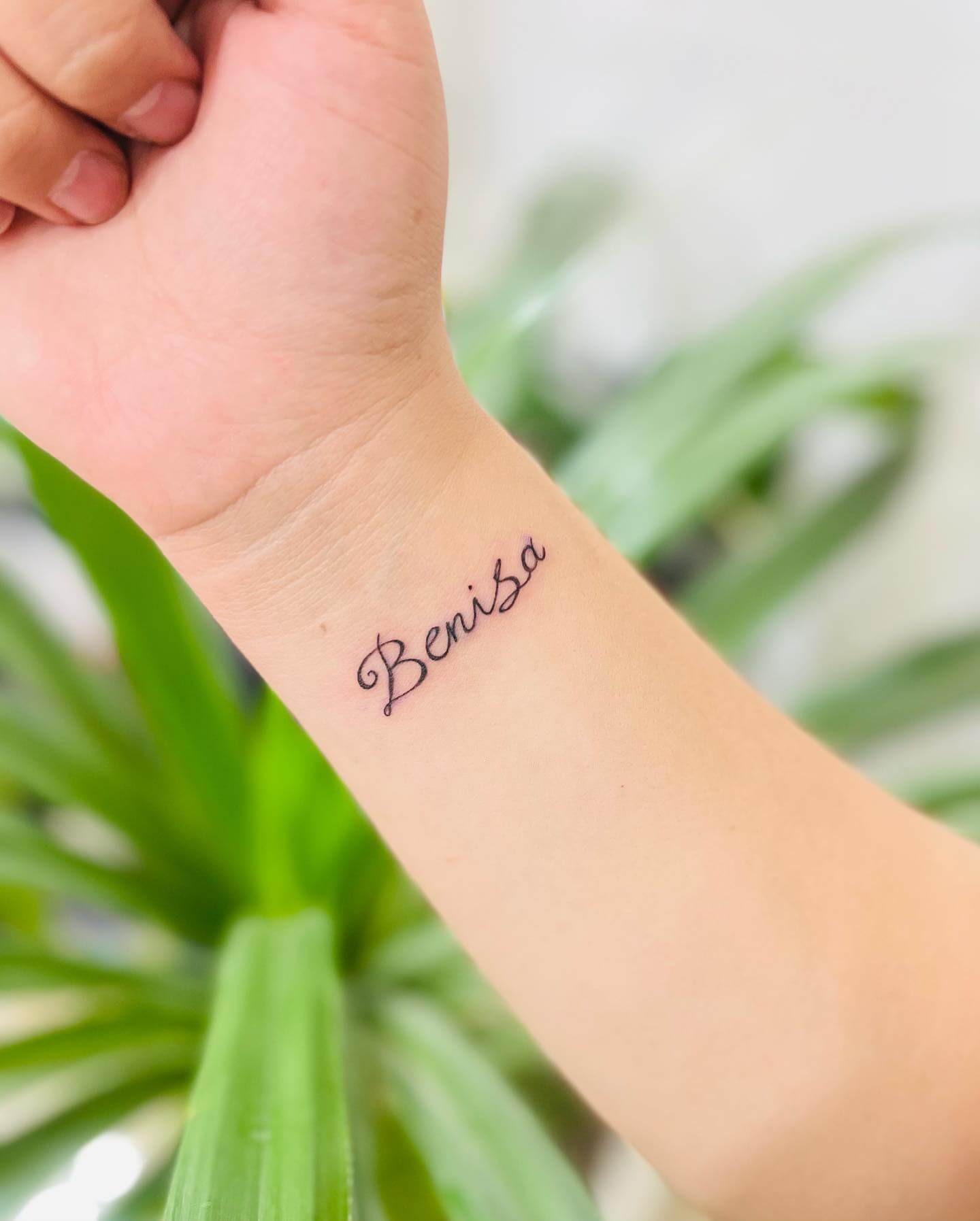 Female Name Wrist Tattoo