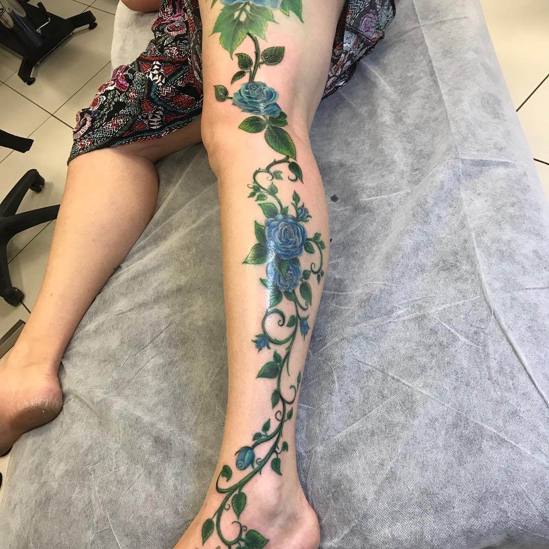 Elaborate Blue Rose Vine Tattoo For Your Entire Leg