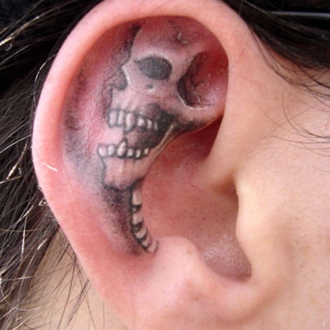 Black Skull Ear Tattoo