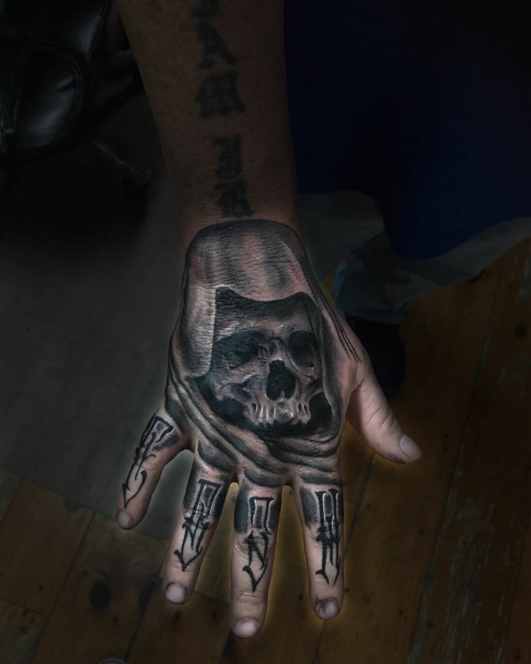 Skull Hands Tattoos