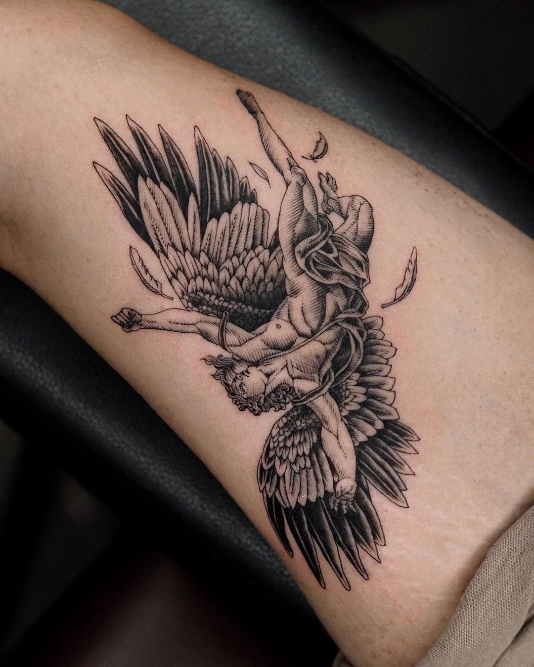 A Complex Graphic Icarus Tattoo