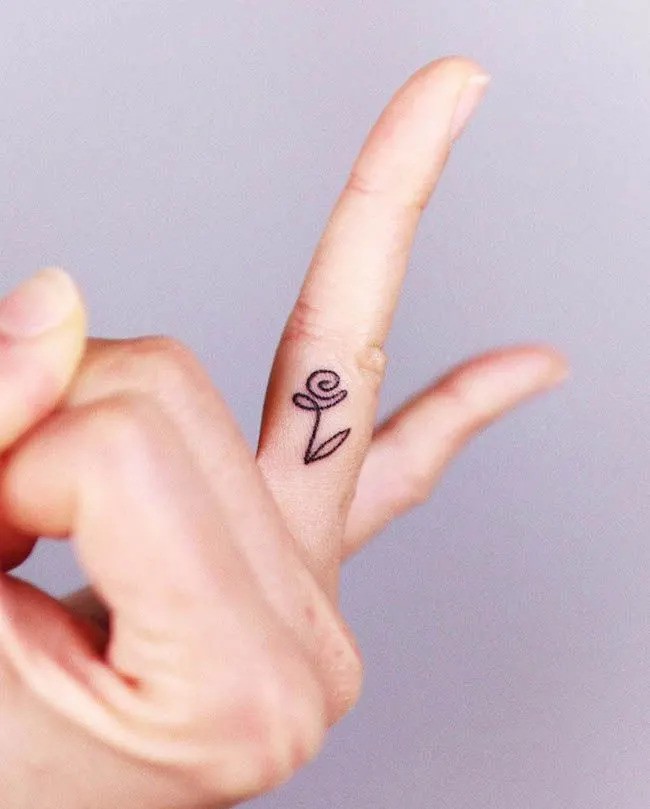 Finger Dot Tattoo