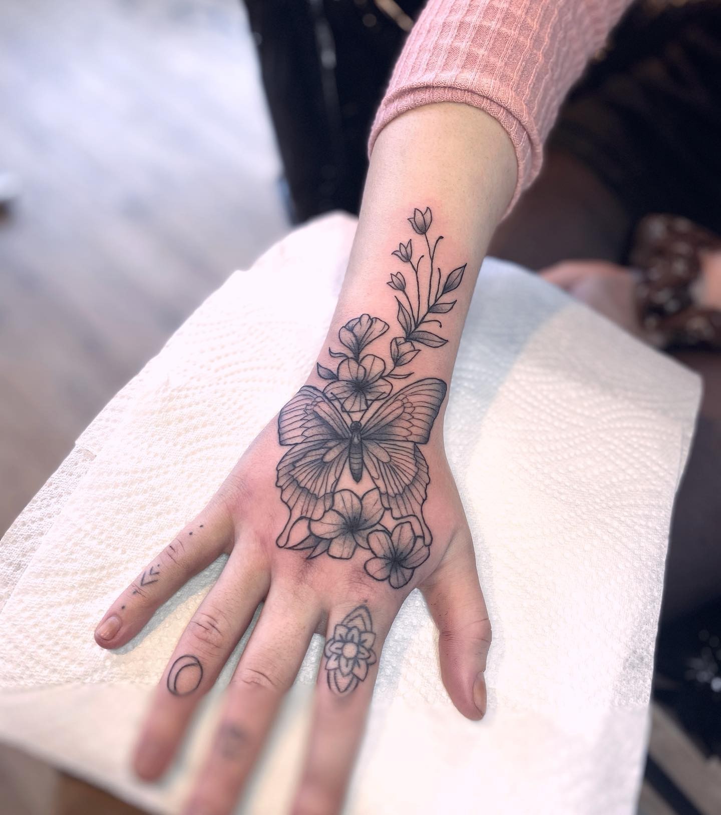 Floral Butterfly Hand Tattoo