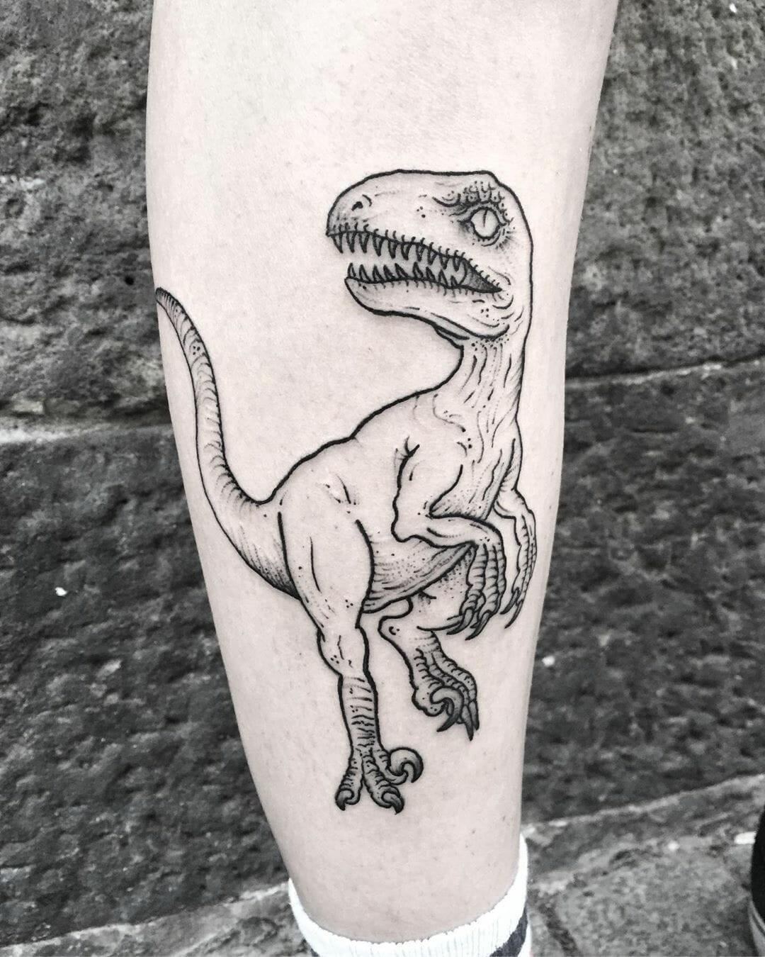 Black Ink Velociraptor Tattoo