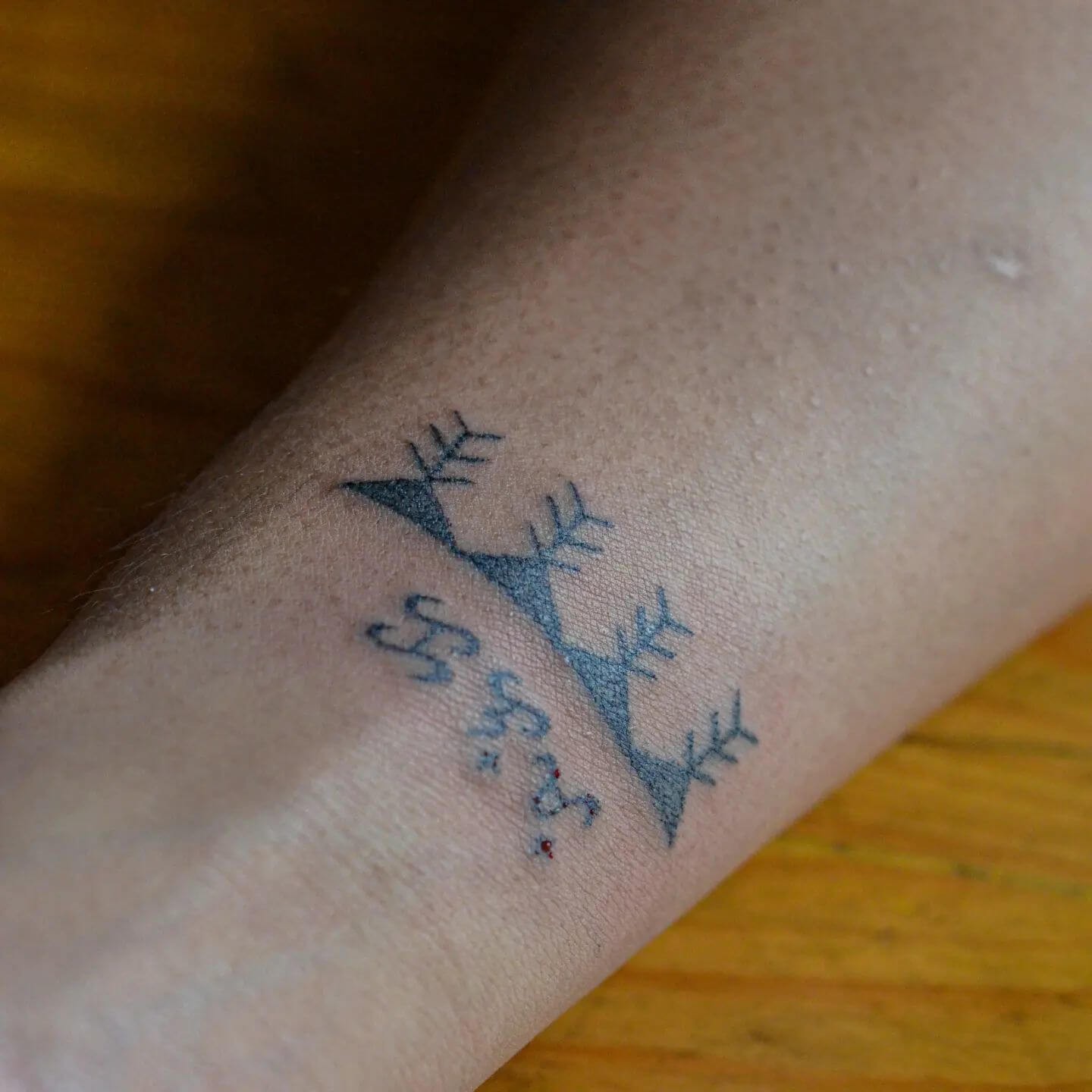 Minimalistic And Dainty Kalinga Hand Tattoo Design