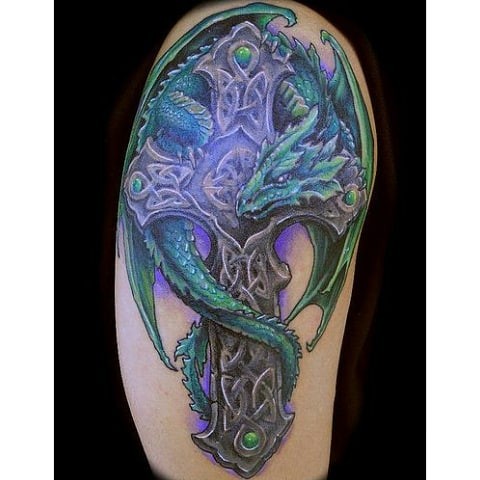 Elaborate Dragon And Celtic Cross Sleeve Tattoo