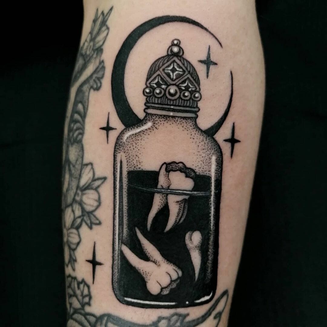 The Teeth inside the Perfume Bottle Tattoo