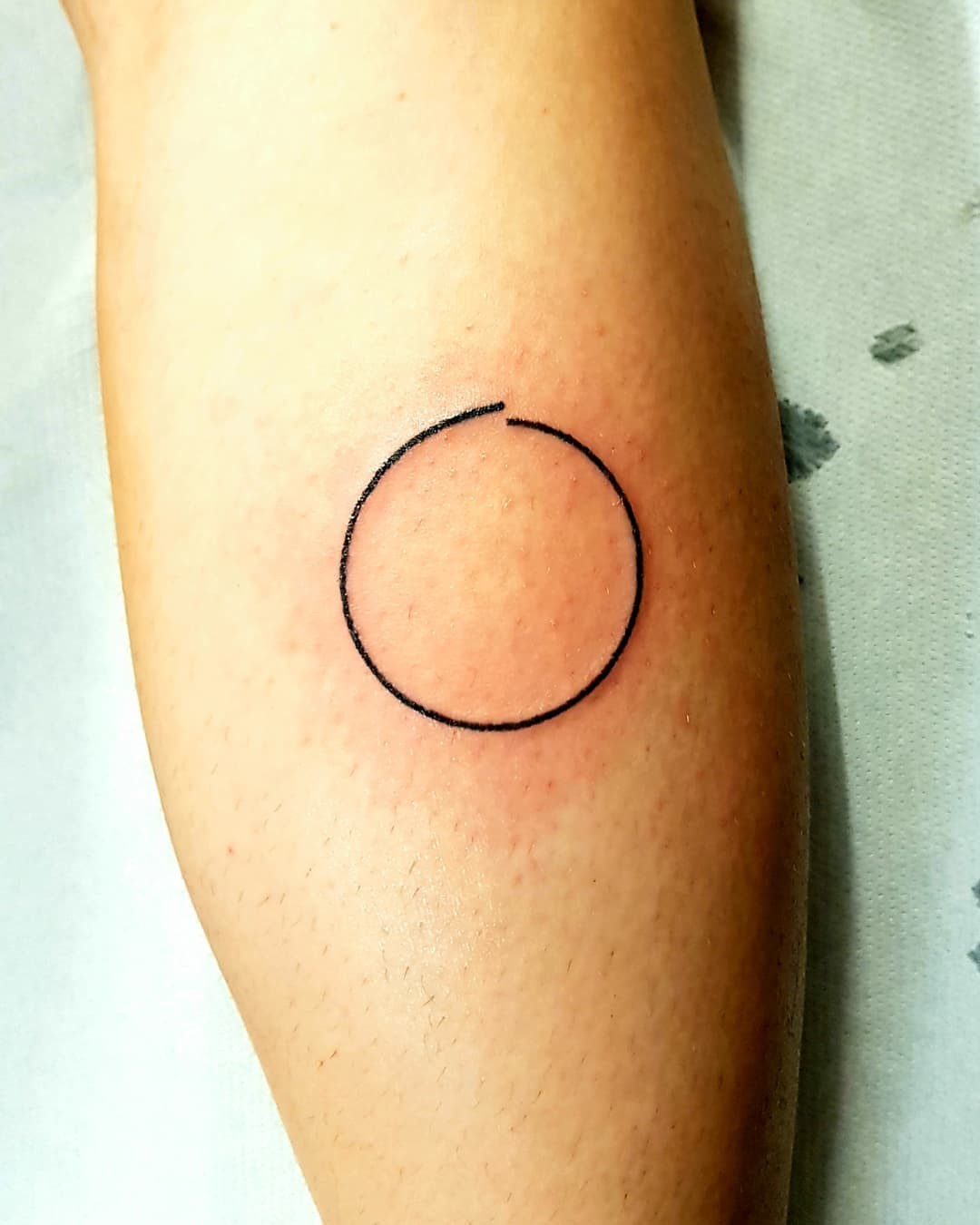 Simple Full Circle Tattoo