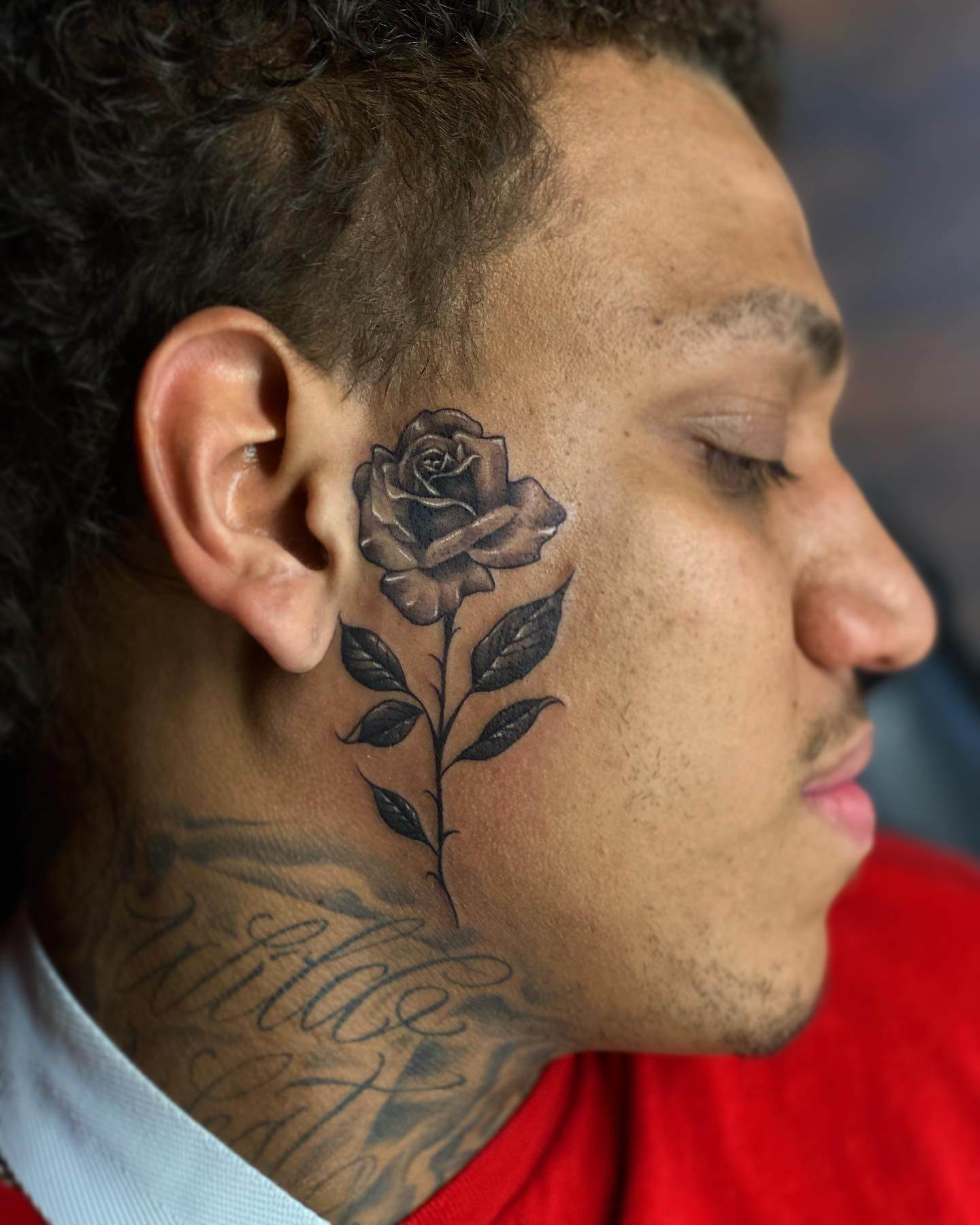 Bold Rose Face Tattoo