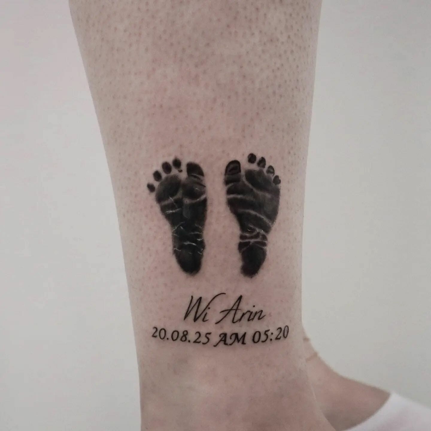 Baby Feet With Name Tattoo