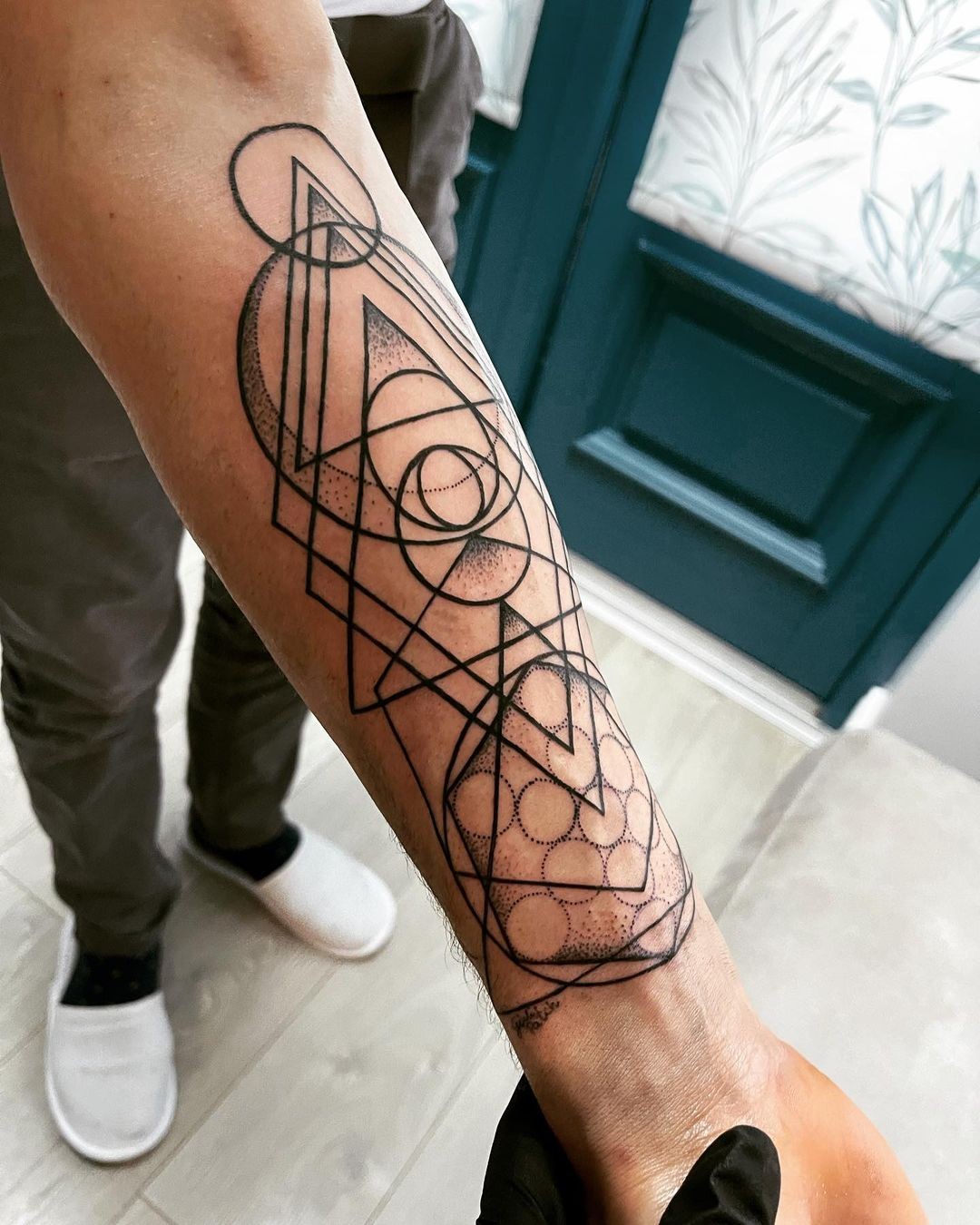 Elaborate Geometric Circle Tattoo