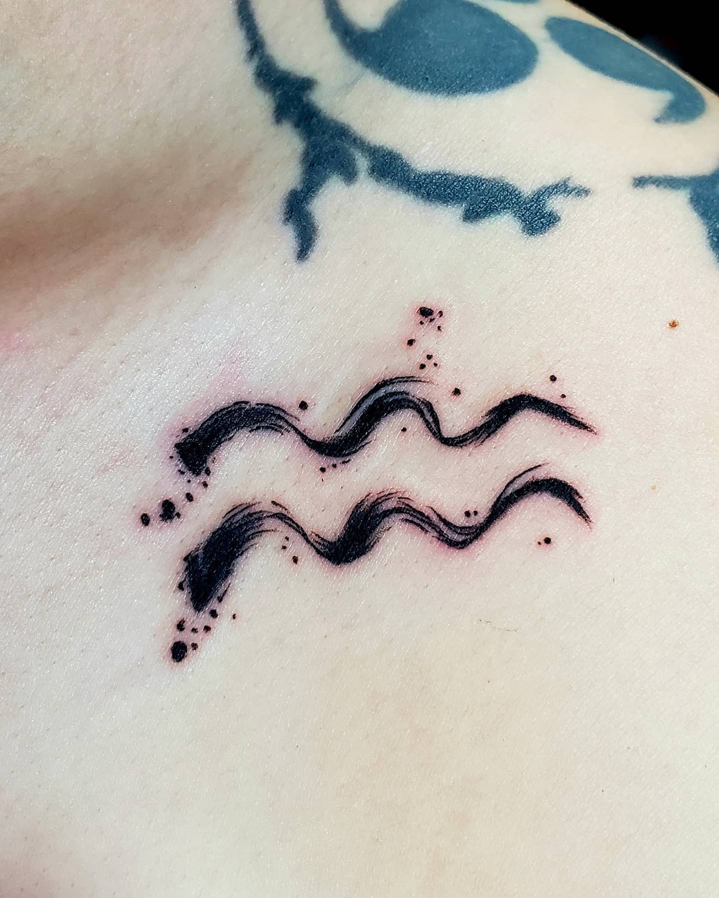 Brushstroke Aquarius Tattoo