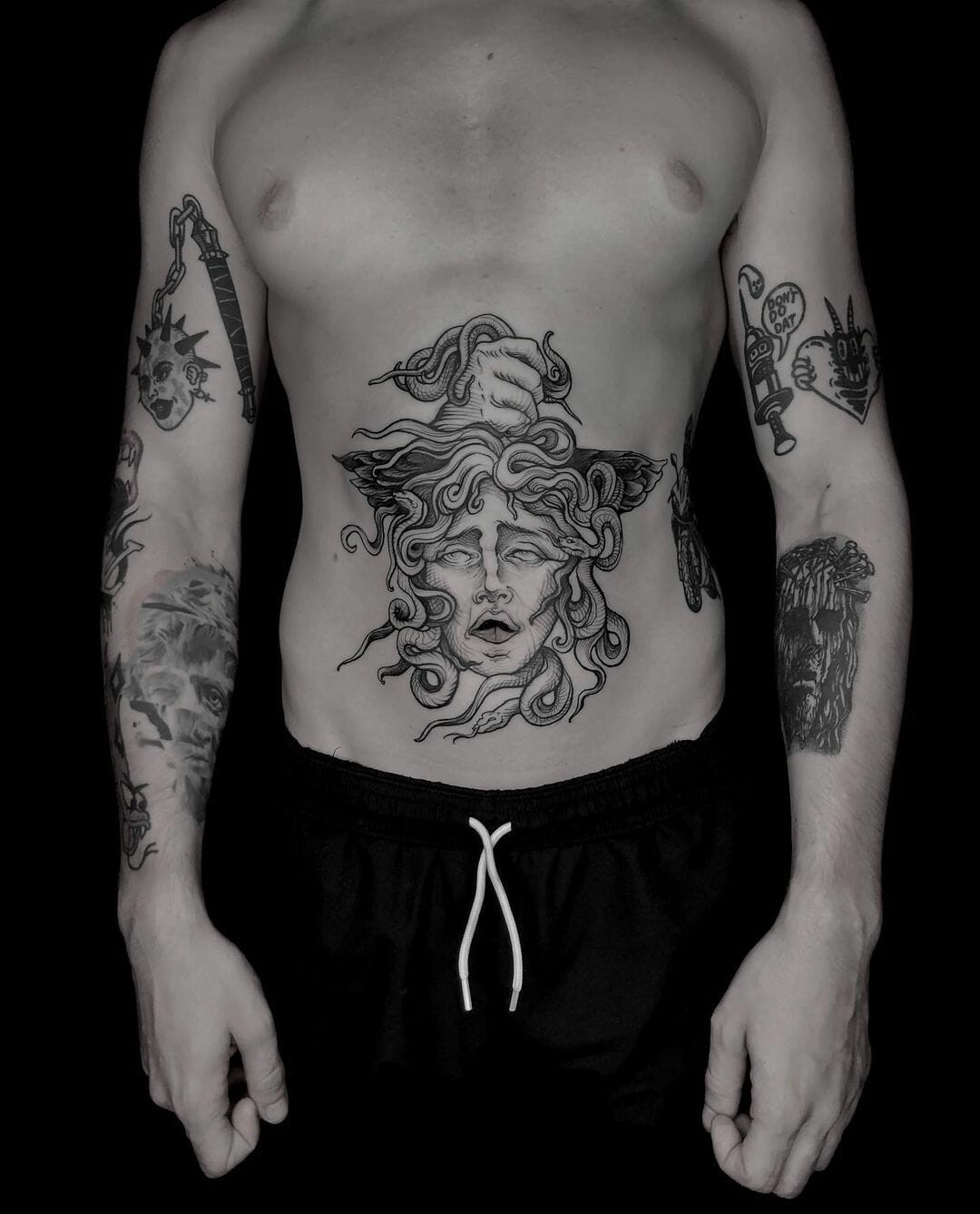 Medusa Belly Button Tattoo