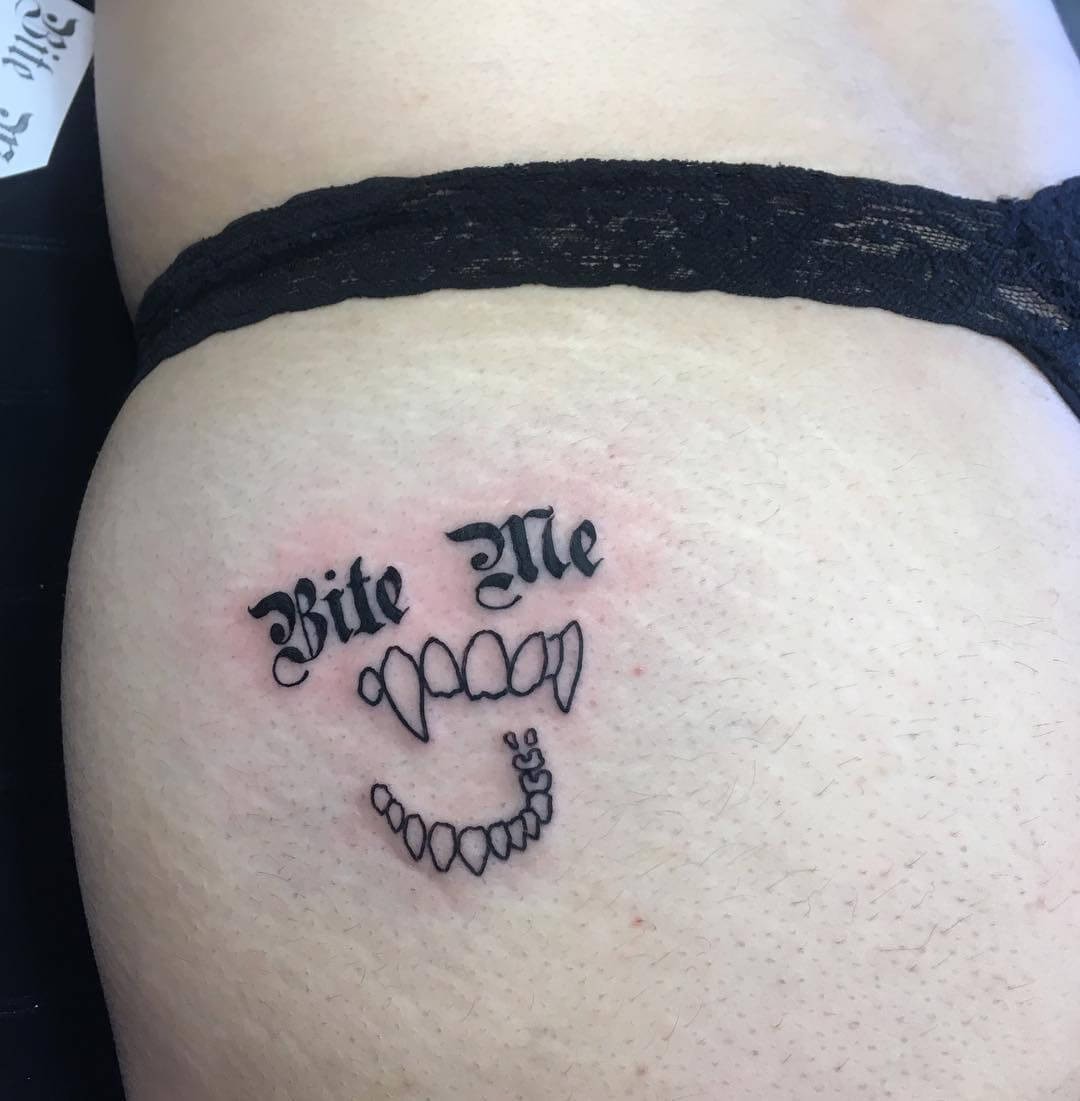 Vampire Fangs With Bite Me Tattoo