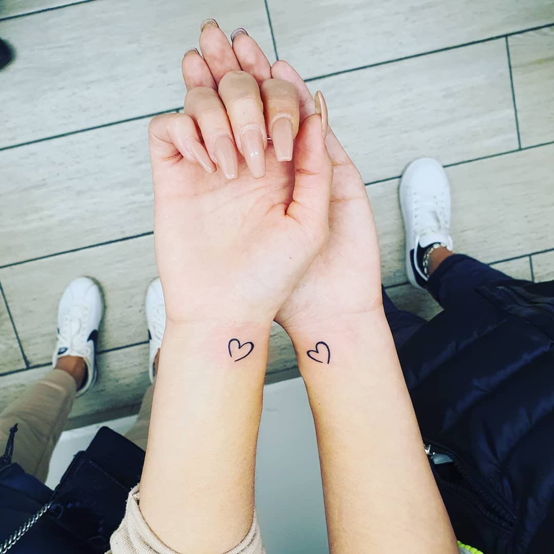 Black Ink Couple Heart Tattoo Designs