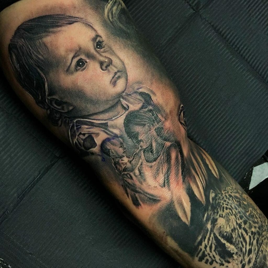 Realistic Baby Inner Bicep Tattoo