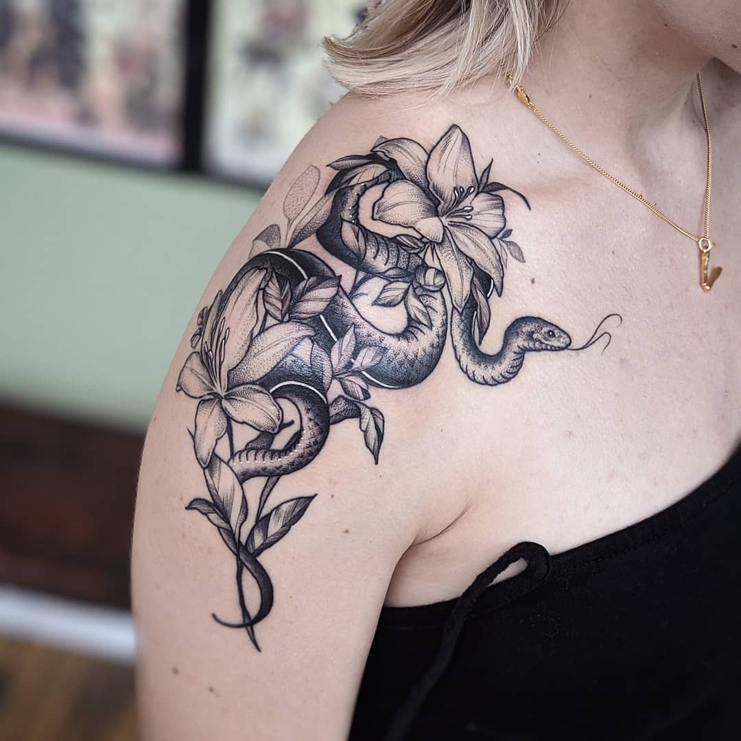 Snake And Lily Shoulder Cap Tattoo